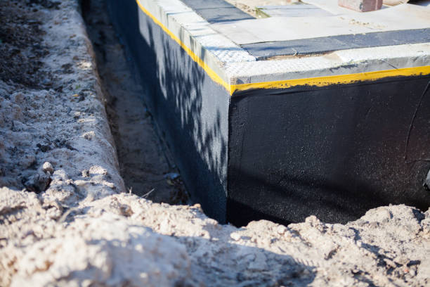 Professional Waterproofing technician working in Babylon, NY